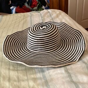 Black and white straw hat swirls around nice